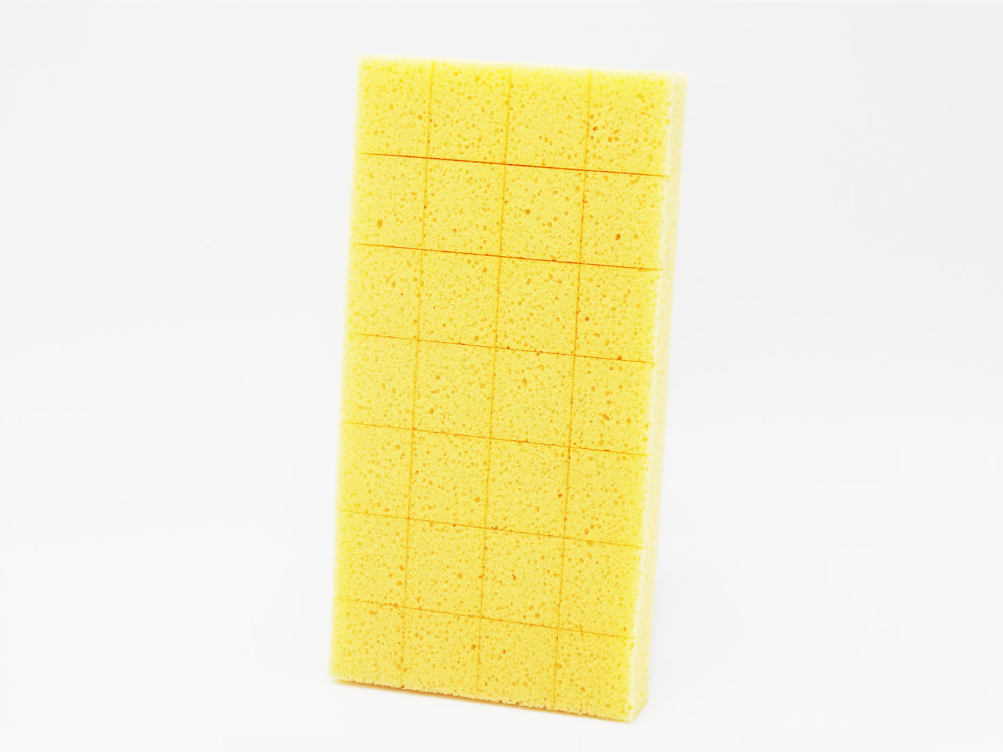 Notched sponge trowel